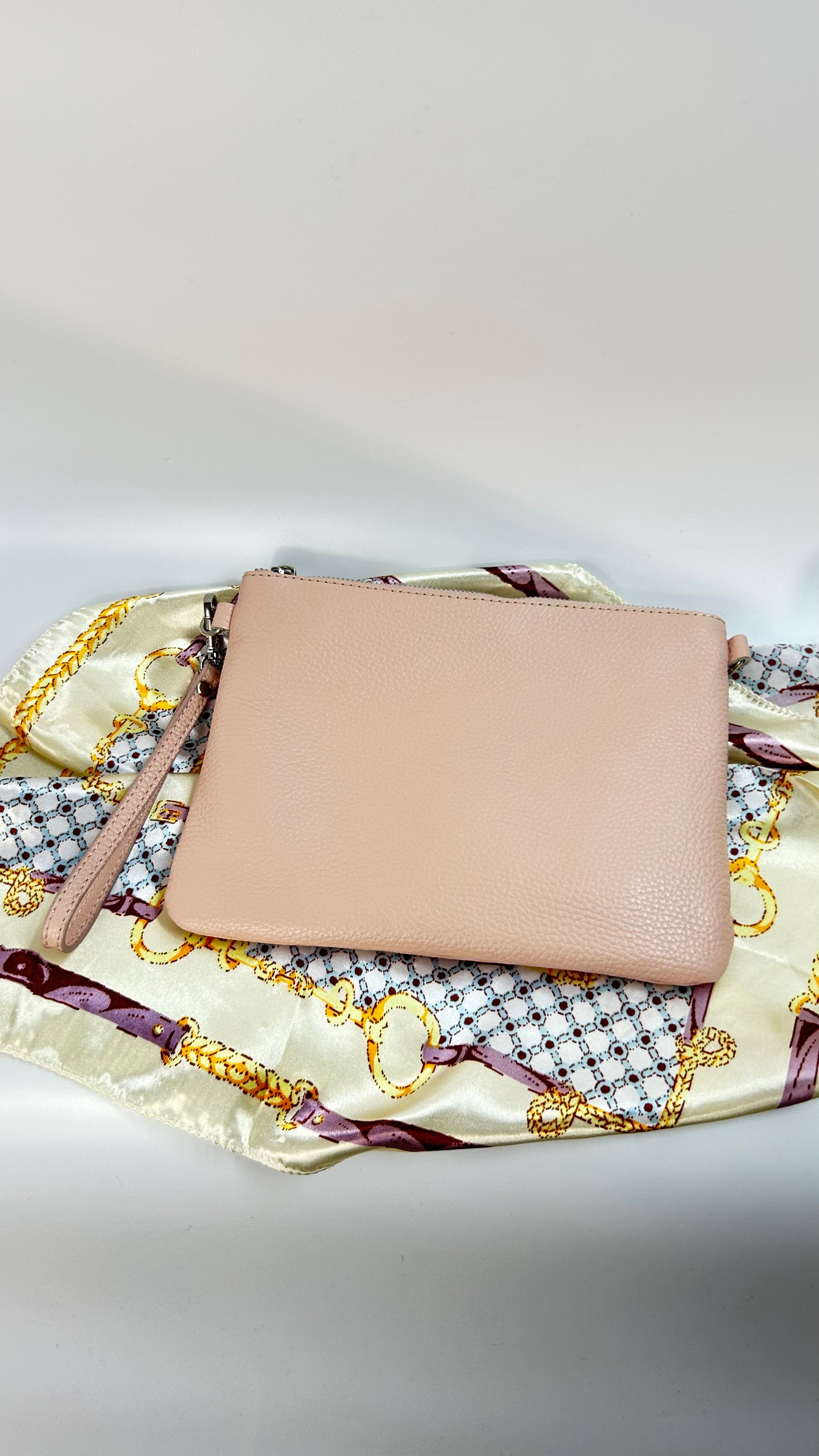 POCHETTE IN VERA PELLE MARTELLATA